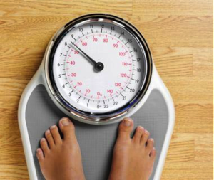 Photo of feet on floor scale